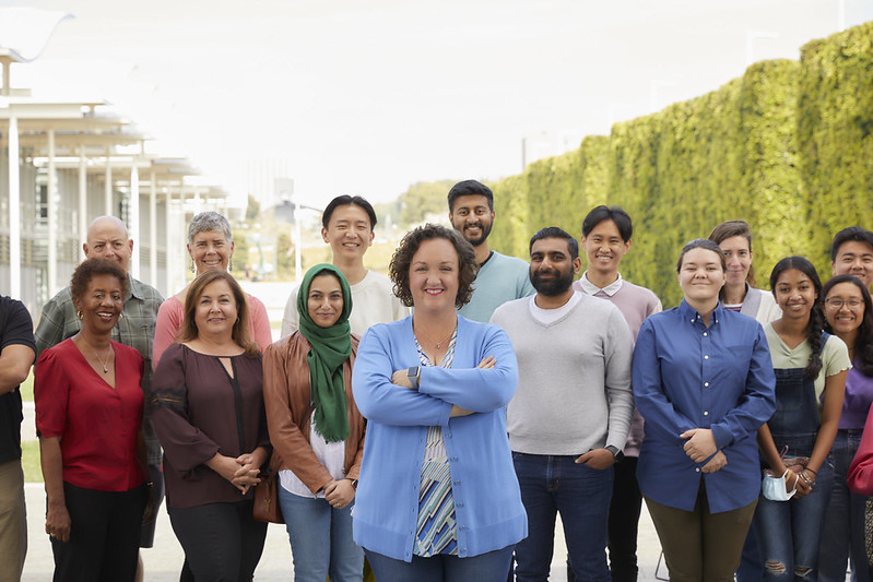 Katie Porter with a multi-racial group of California supporters